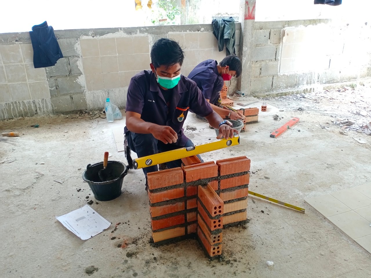 ข่าวราชการ, รัฐวิสาหกิจ - สถาบันพัฒนาฝีมือแรงงาน 25 นราธิวาส ทดสอบมาตรฐานฝีมือแรงงาน สาขาช่างก่ออิฐ ให้กับนักศึกษาก่อนจบ